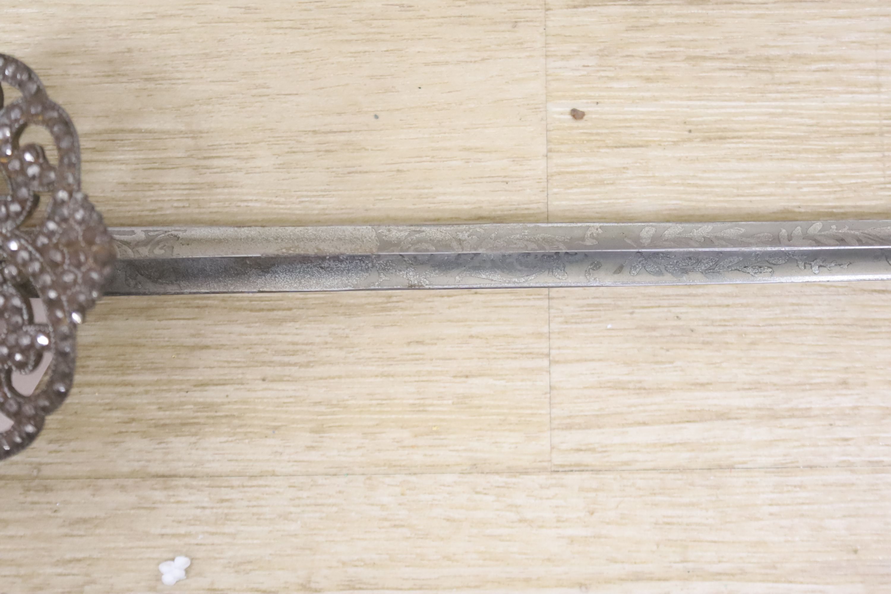 A 19th century cut steel handled dress sword, length 97cm